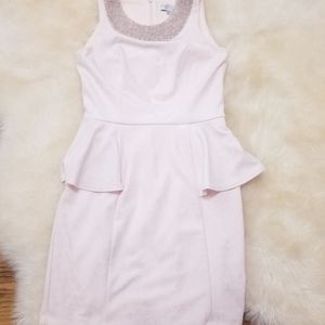 Blush leopard print peplum dress by Jackie Jon